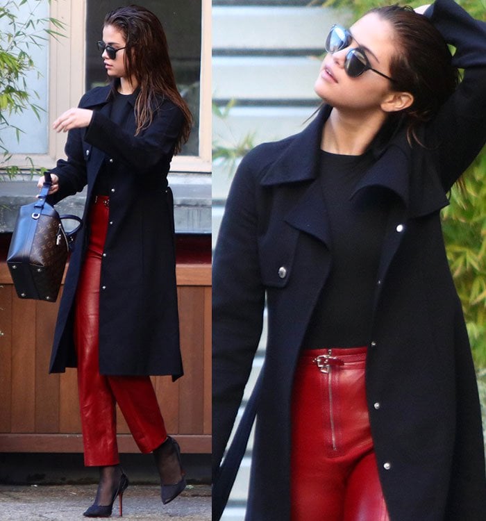 Selena Gomez pairs a navy coat with her red leather pants
