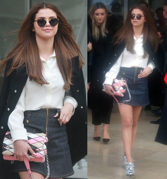 Selena Gomez carries a Louis Vuitton bag and covers up with a peacoat in Paris