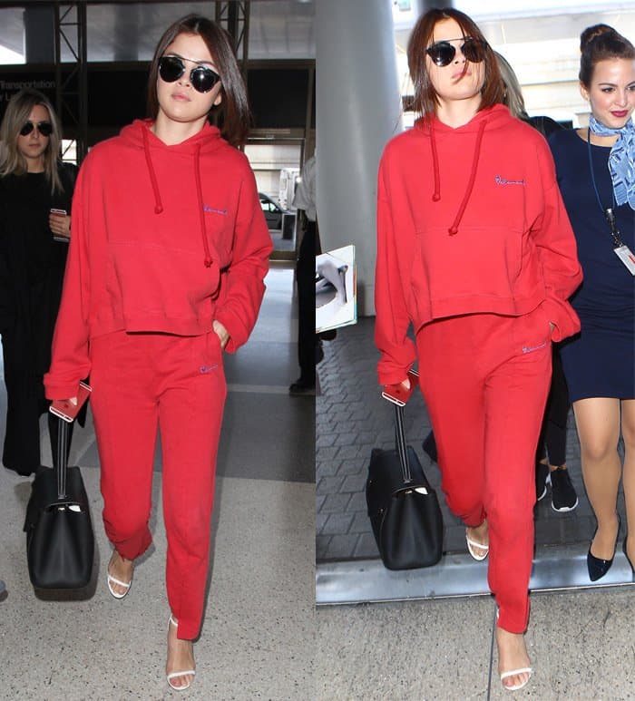Selena Gomez wore Vetements cut-out cuffs track pants with white sandals