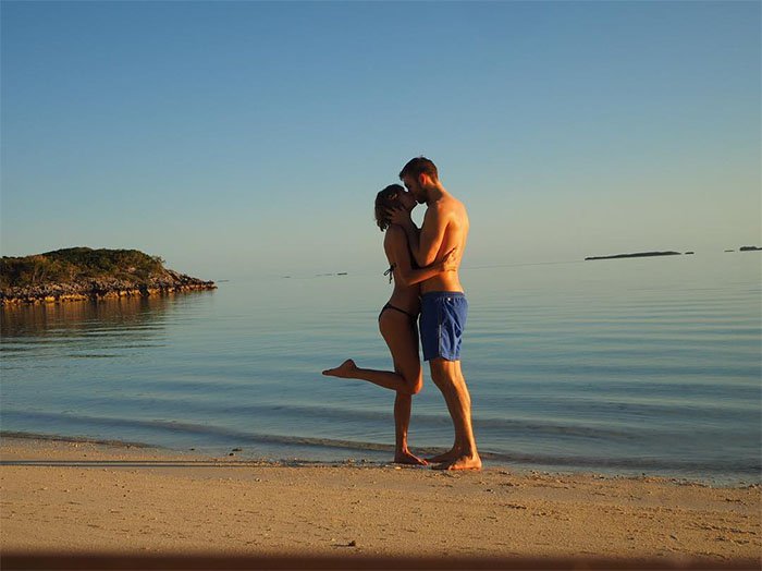 Taylor Swift and Calvin Harris celebrate their one-year anniversary by escaping to a tropical island for a romantic getaway