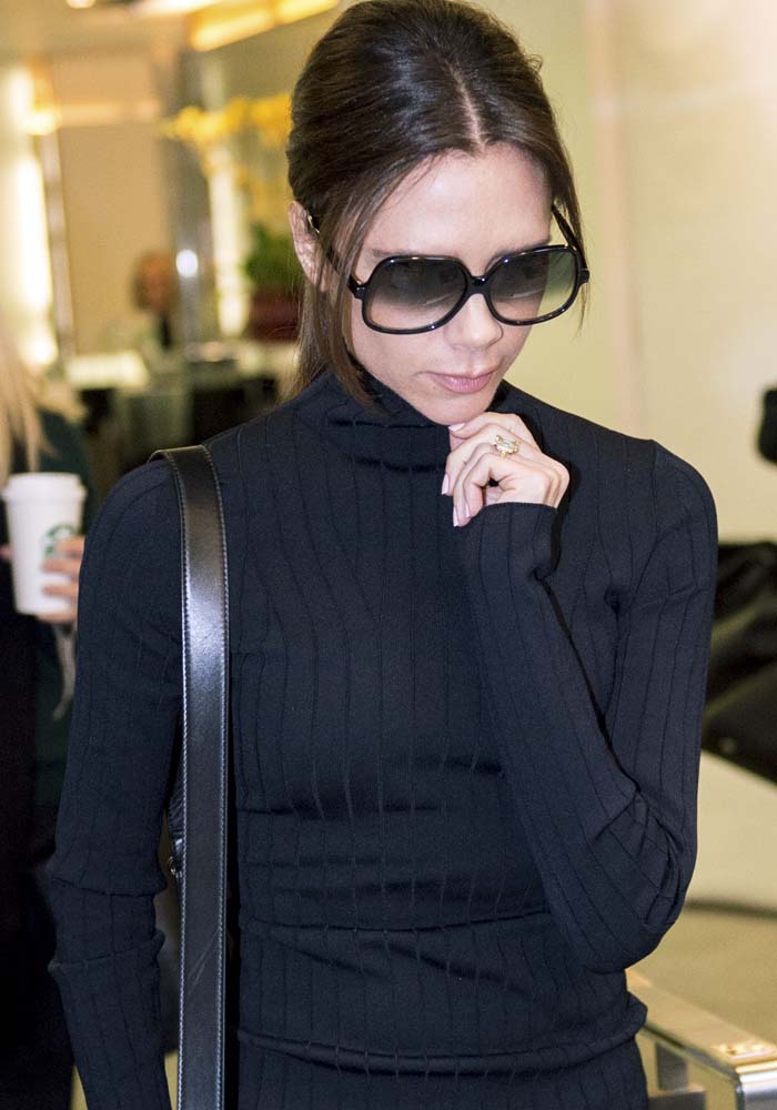 Victoria Beckham arrives at her store opening event in Hong Kong