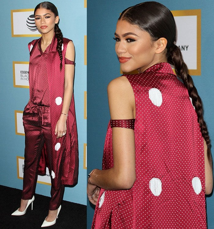 Zendaya shows off the fringed polka dot embellishments on her silk Thakoon robe