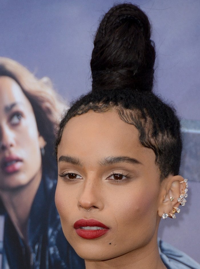 Zoe Kravitz wears her dark hair up at the premiere of her latest film "Allegiant"