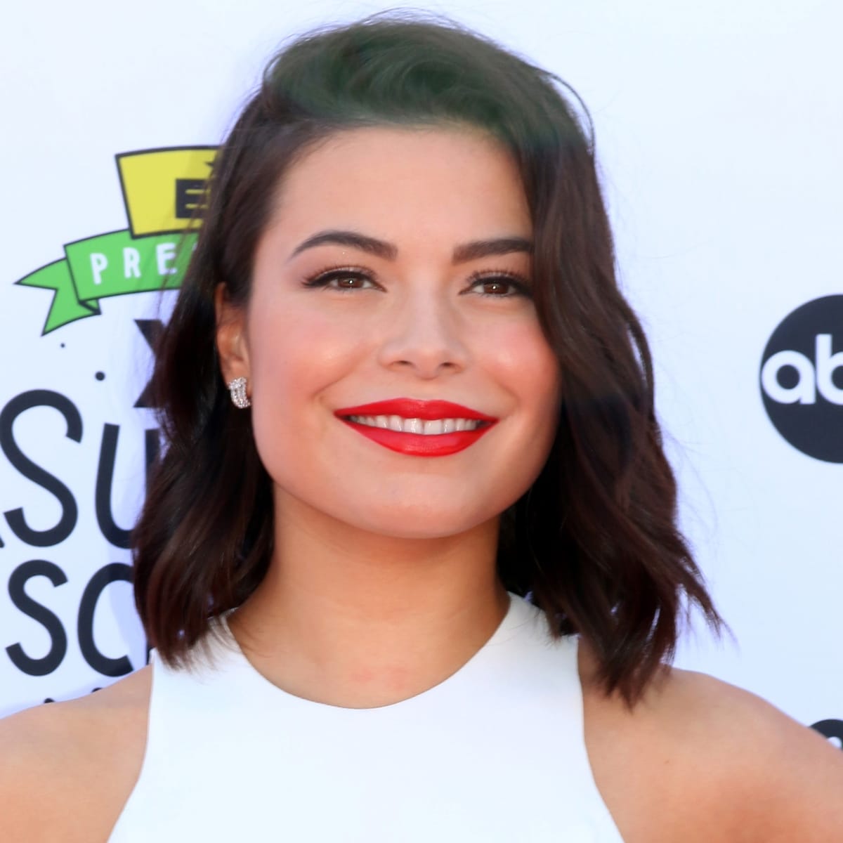 Actress Miranda Cosgrove in a white Georges Chakra Couture dress