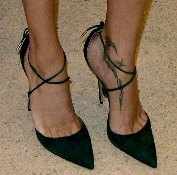 Adriana Lima shows off her feet in black Aquazzura pumps