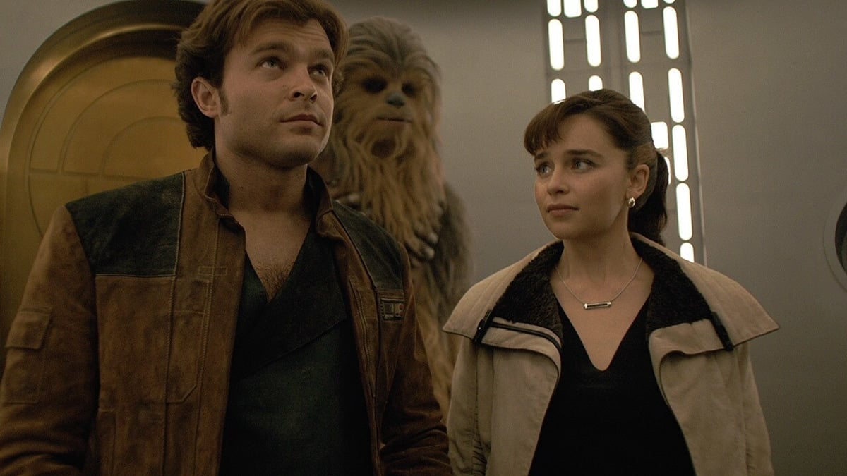 Alden Ehrenreich as Han Solo and Emilia Clarke as his romantic interest Qi'ra in the 2018 American space Western film Solo: A Star Wars Story