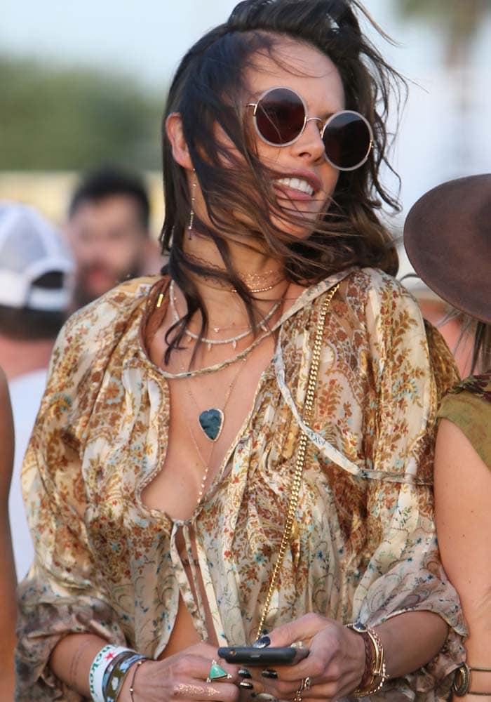 Alessandra Ambrosio wears her hair down during the first day of Coachella