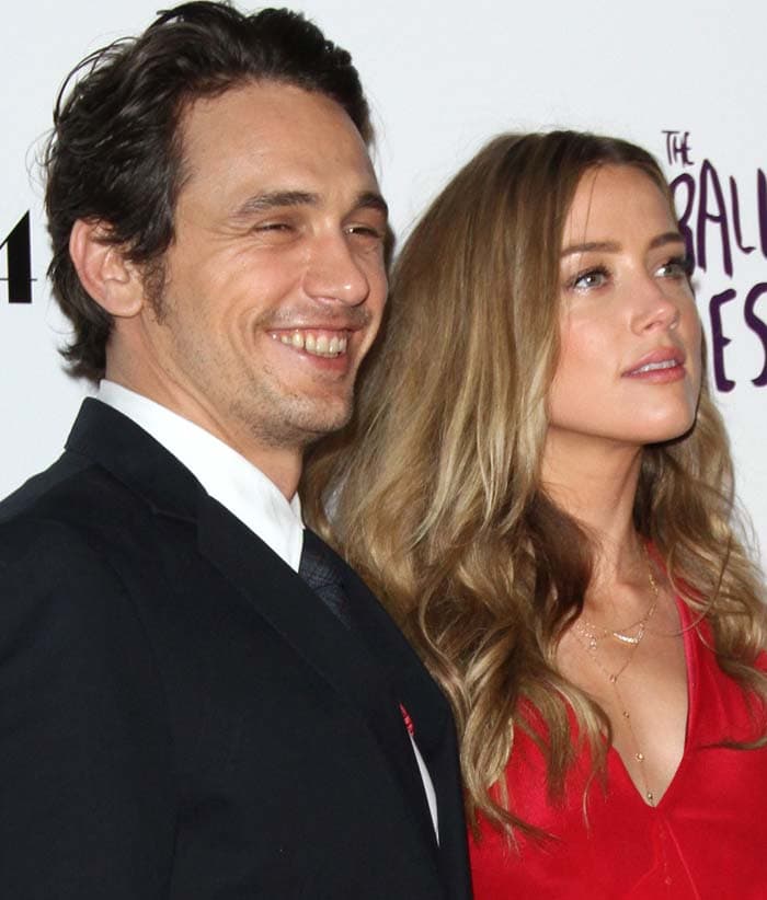 Amber Heard and her "The Adderall Diaries" co-star James Franco posing for photos on the red carpet