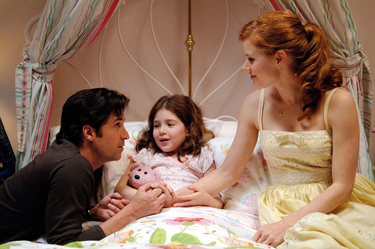 Patrick Dempsey as Robert Philip, Amy Adams as Giselle, and Rachel Covey as Morgan Philip in Enchanted