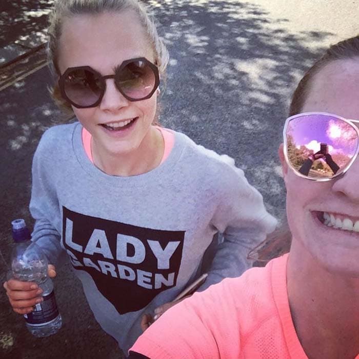 Cara Delevingne and Chloe Delevingne take a selfie while running a 5K charity race for Lady Garden