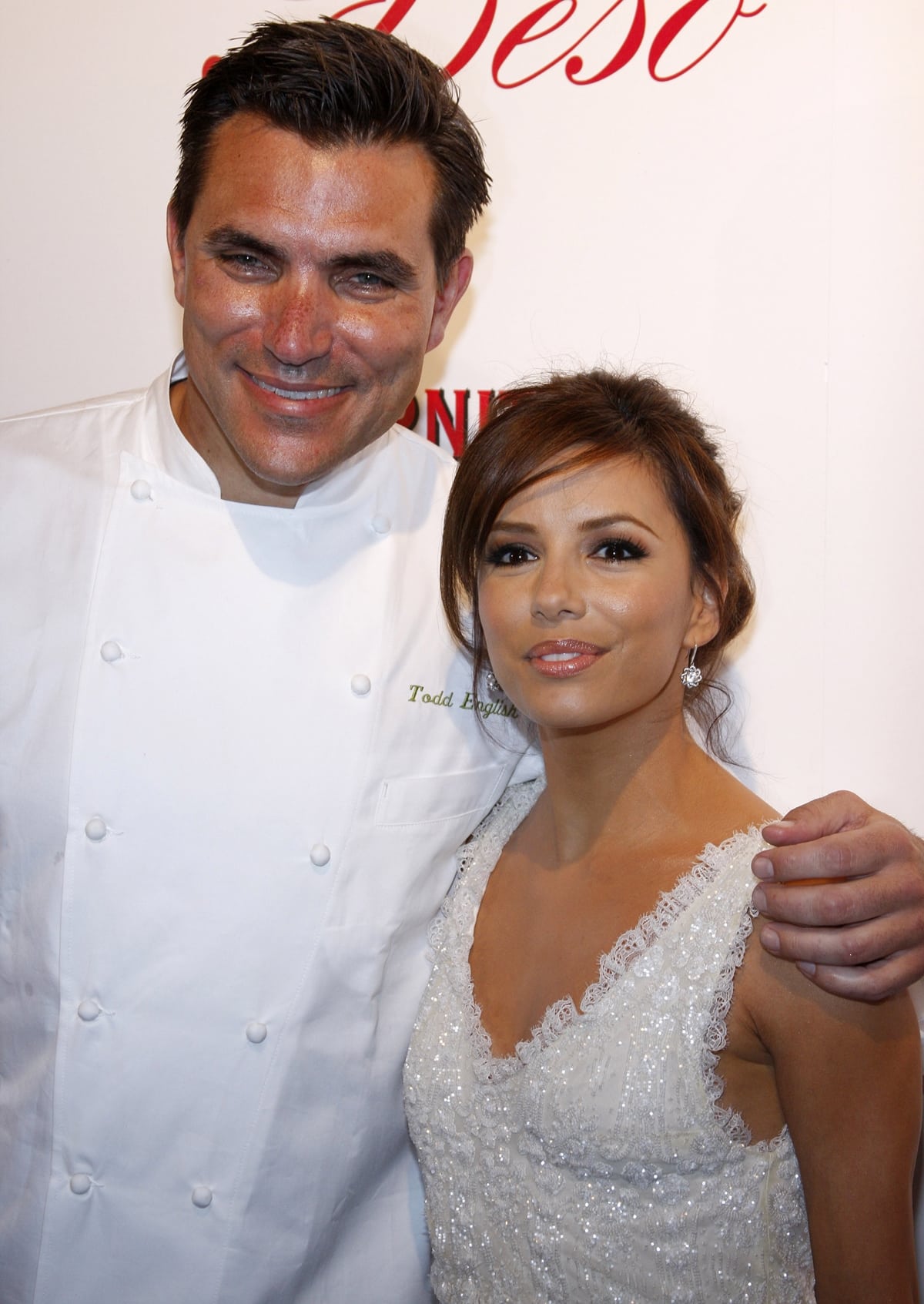 Eva Longoria Parker in a Marchesa dress at the opening of her new restaurant, Beso, with Chef Todd English on Hollywood Boulevard