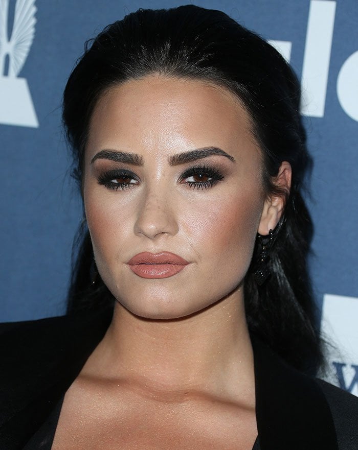 Demi Lovato keeps her makeup dark and sultry