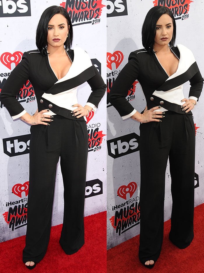 Demi Lovato wears an '80s-inspired suit on the red carpet