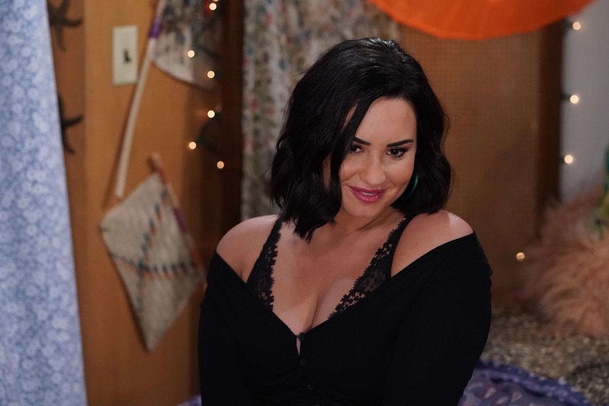 Demi Lovato portrays Jenny, a surrogate mom and cam girl, in the final season of Will & Grace