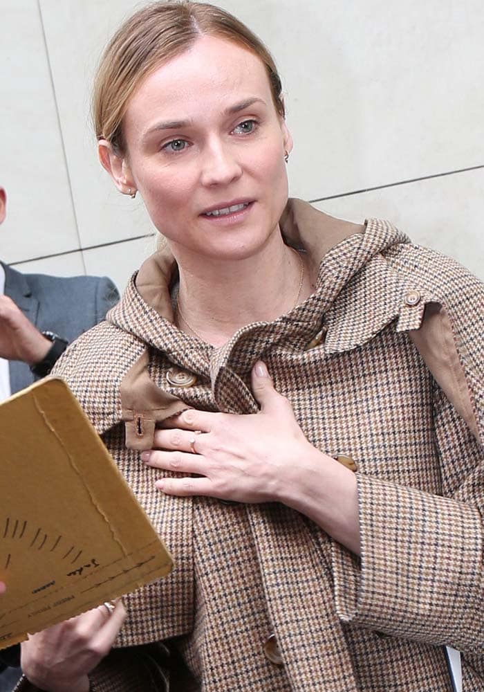 Diane Kruger wears her hair in a ponytail as she arrives at RTL Radio