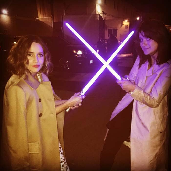 Emilia Clarke shows she knows how to with a lightsaber, a fictional energy sword featured throughout the Star Wars franchise