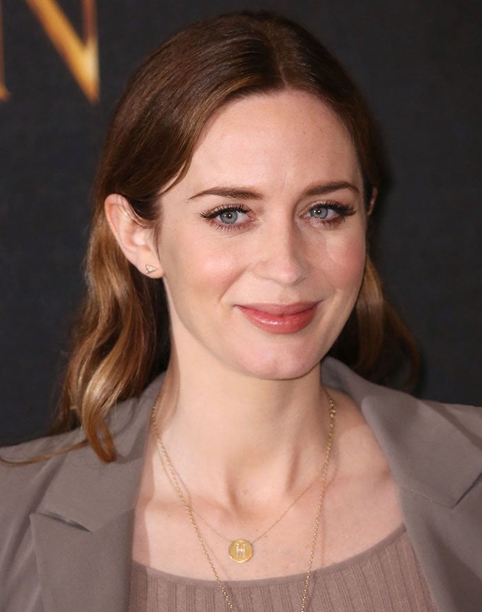 Emily Blunt wears her hair down for the photo call for "The Huntsman: Winter's War"
