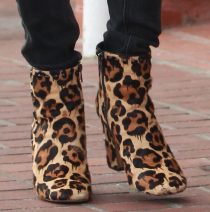 Emma Roberts's feet in leopard-print Coach booties