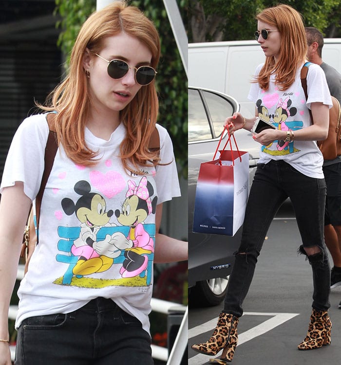 Emma Roberts wears a Mickey Mouse and Minnie Mouse graphic tee while out shopping