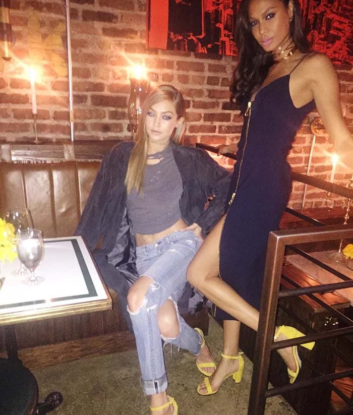 Joan Smalls and Gigi Hadid celebrating that Stuart Weitzman has partnered with Pencils of Promise (PoP) to build schools in developing countries