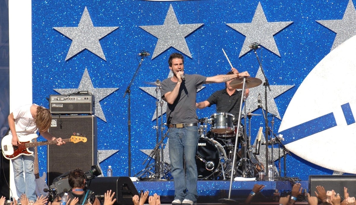 Guitarist James Valintine, lead singer Adam Levine and drummer Ryan Dusick of American pop rock band Maroon 5 perform during a free concert to celebrate the Opening Kickoff of the 2005-06 NFL Season