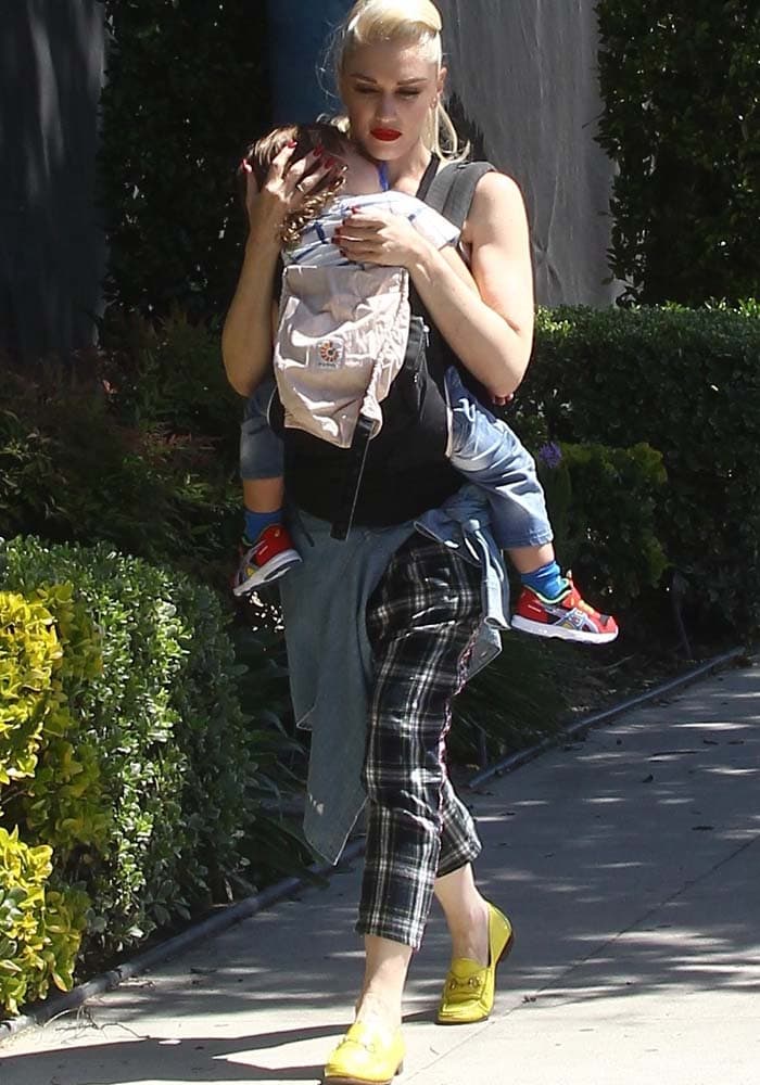Gwen Stefani carries her youngest son, Apollo, while out in Los Angeles