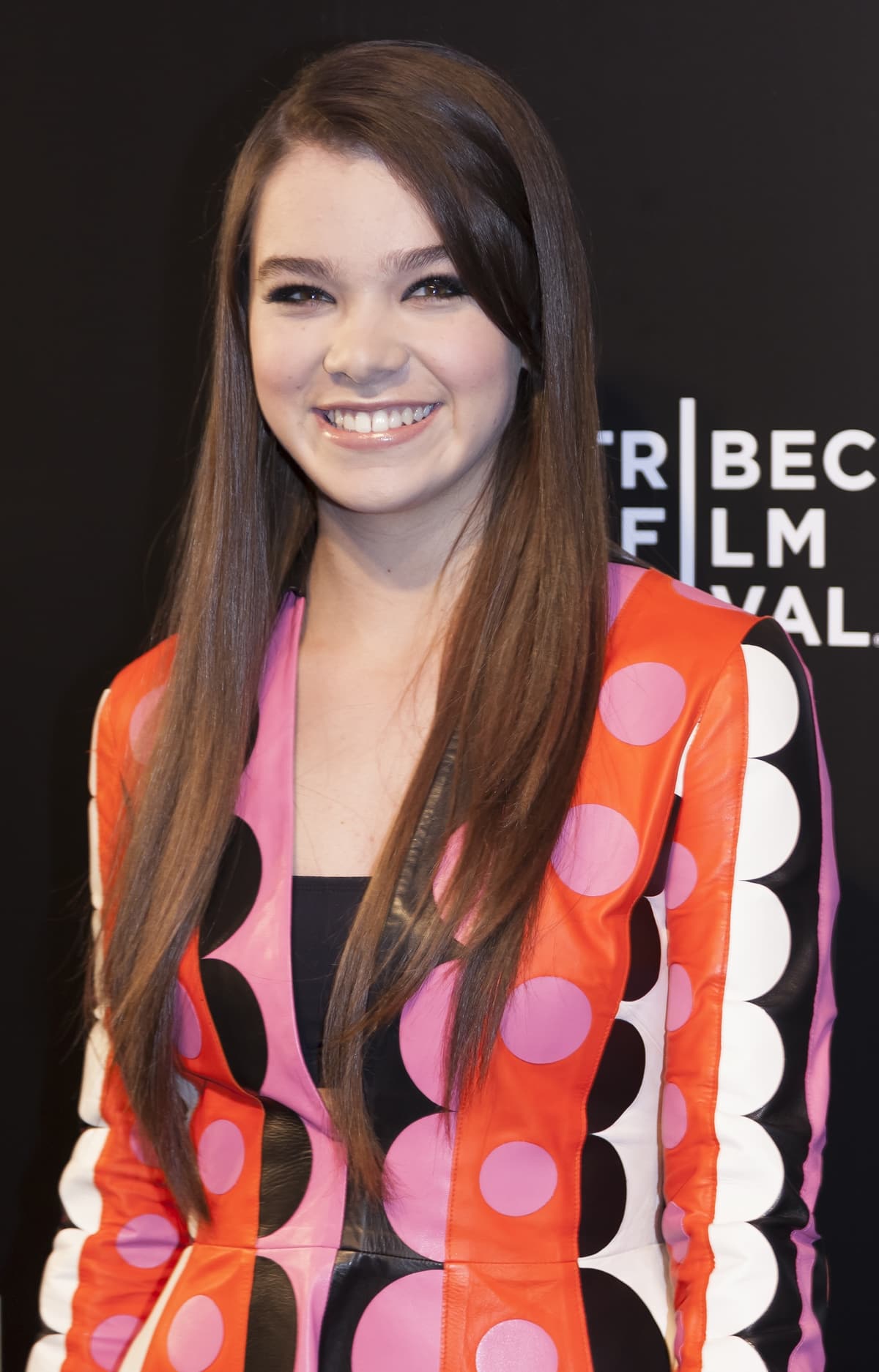Hailee Steinfeld wears a leather patchwork dress from the Valentino Fall 2014 collection at the premiere of "Begin Again," during the 2014 Tribeca Film Festival