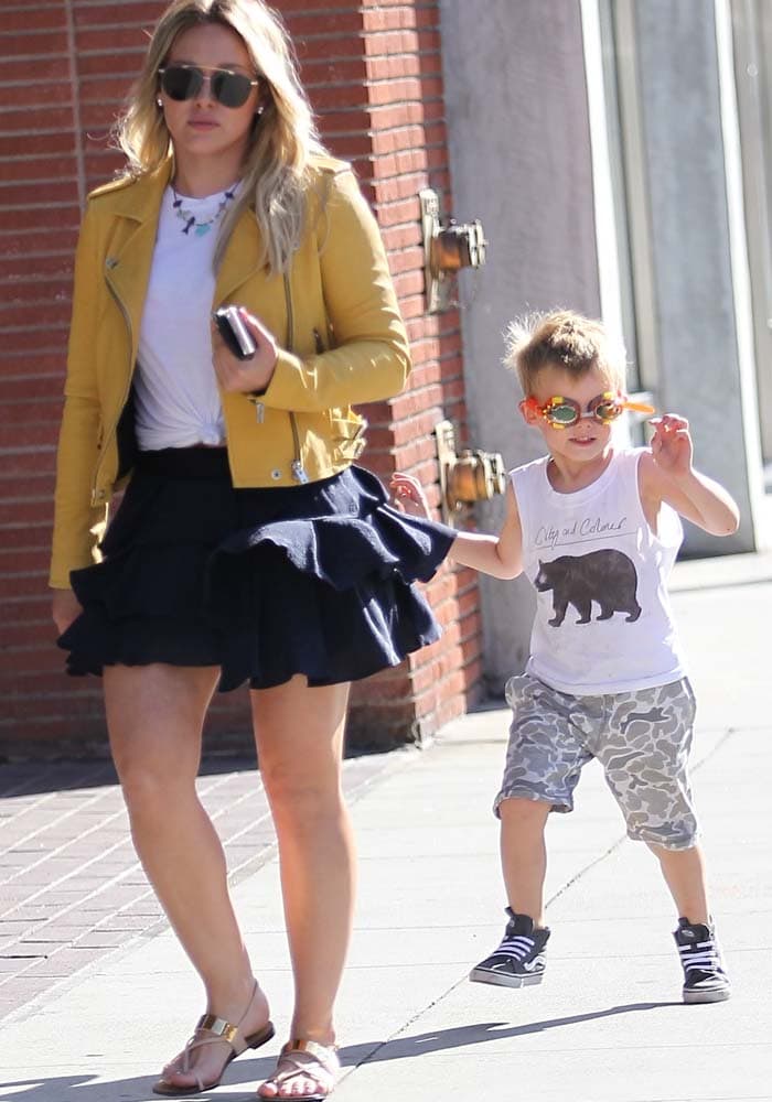 Hilary Duff and her son Luca stroll around Beverly Hills during a shopping trip