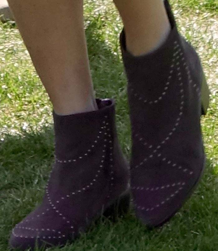 Jamie Chung wears studded Grey City boots to Coachella
