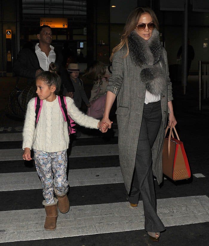 Jennifer Lopez with her daughter arriving at Heathrow Airport in London on April 8, 2016