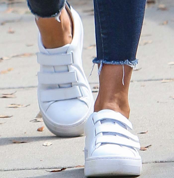 Jessica Alba wears white Kenneth Cole sneakers