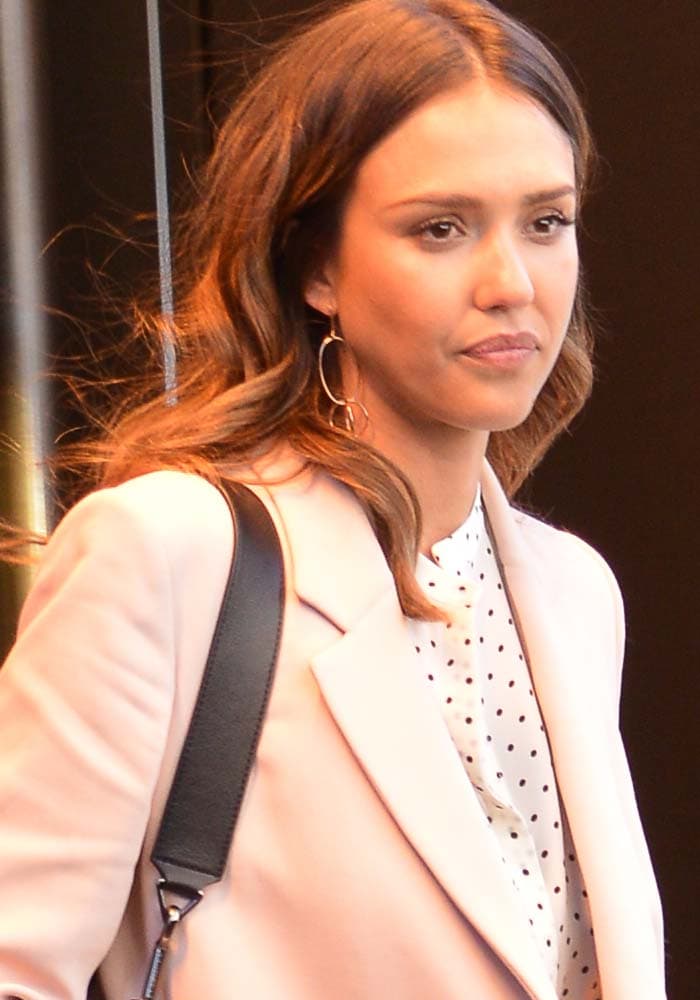 Jessica Alba wears her hair down as she leaves her New York hotel
