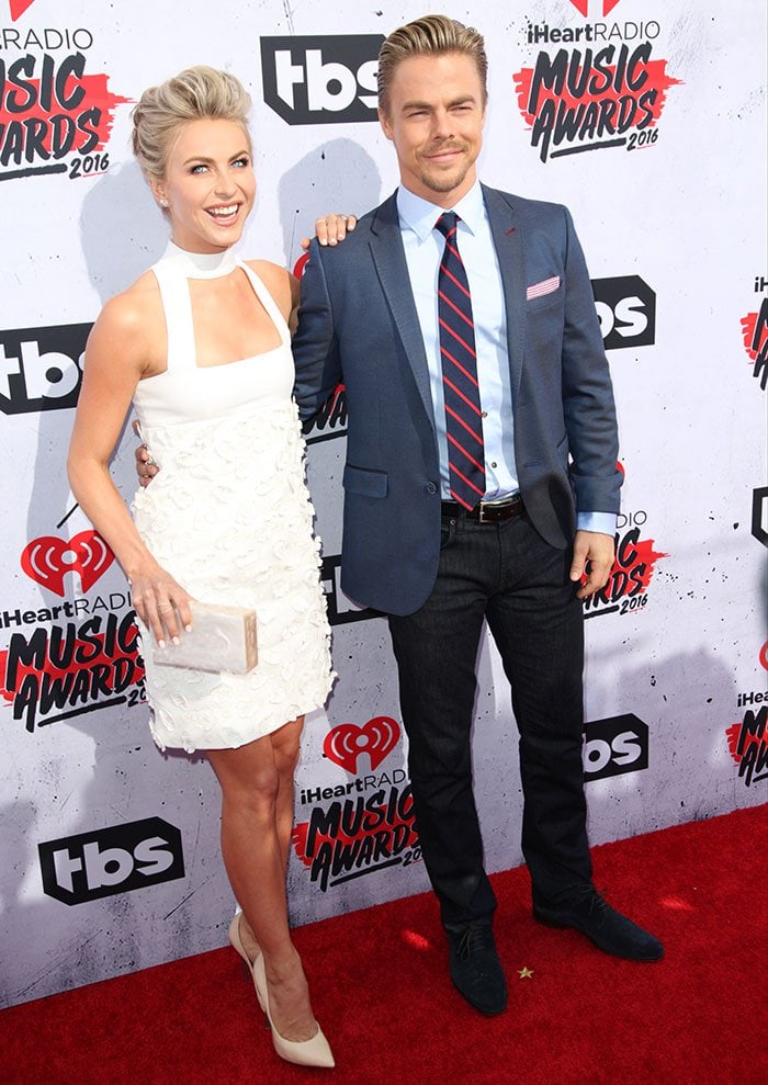 Julianne Hough poses for photos with her brother, Derek Hough, at the iHeartRadio Music Awards
