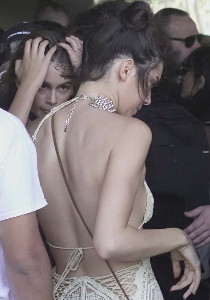 Kendall Jenner shows off her back in a sexy crotched dress from Vintage