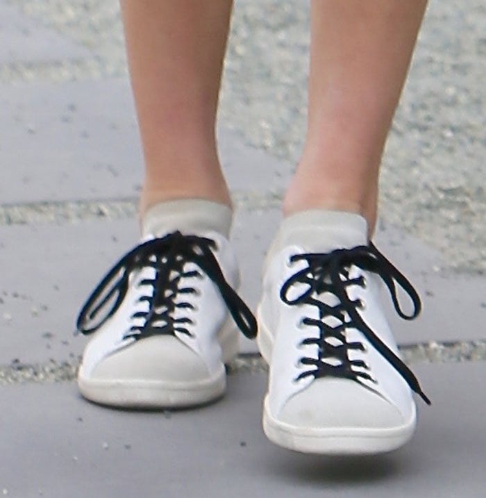 Kendall Jenner's feet in black-laced Isabel Marant sneakers