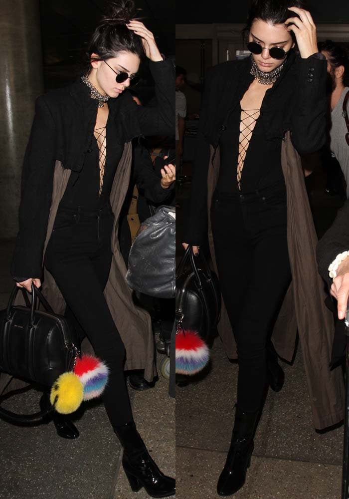 Kendall Jenner draws attention with her low cut T by Alexander Wang bodysuit