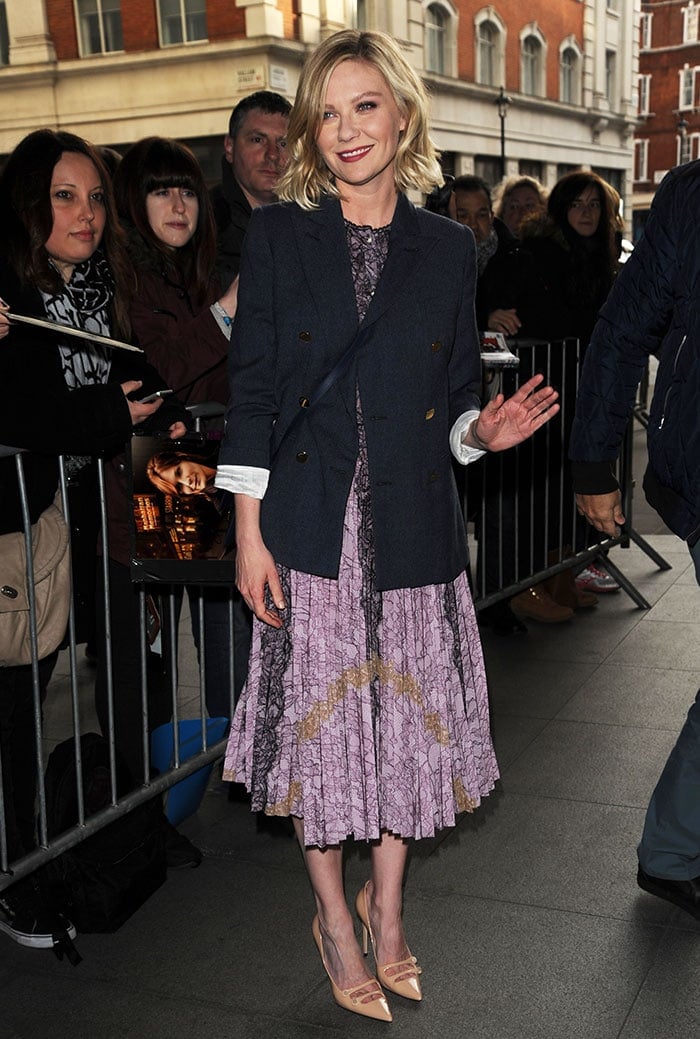 Kirsten looks ready for spring in a floral dress from Gucci's Resort 2016 collection