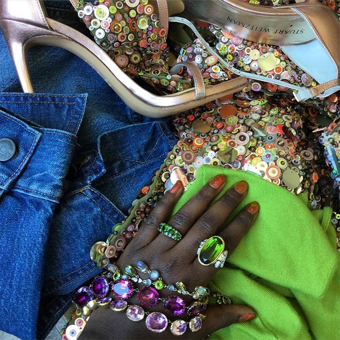Lupita Nyong'o's Instagram post of her clothes and accessories from "The Jungle Book" premiere, which she captioned, "Dat was NIIIICE! @disneythejunglebook is a FANTASTIC movie, personal bias aside! Get your popcorn and open your eyes and take in the WONDER. @theneelsethi is basically the new king of the jungle, period." -- posted on April 6, 2016