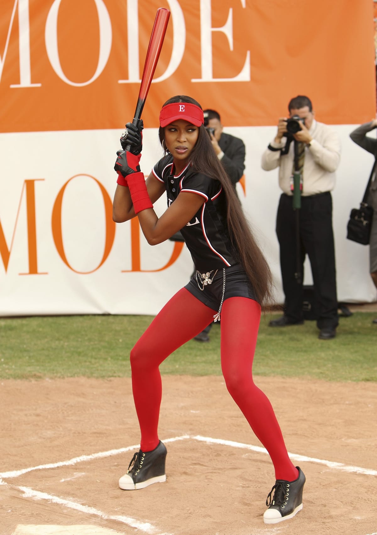 Naomi Campbell wears hotpants and bright red tights in Jump, the 18th episode in the second season of the American dramedy series Ugly Betty