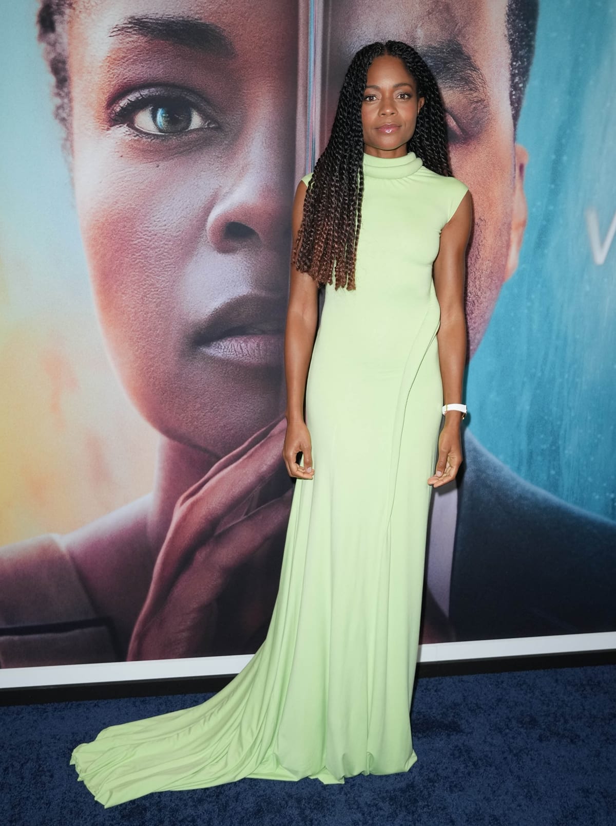 Naomie Harris wears a lime-green Standing Ground sleeveless dress at the premiere of The Man Who Fell To Earth