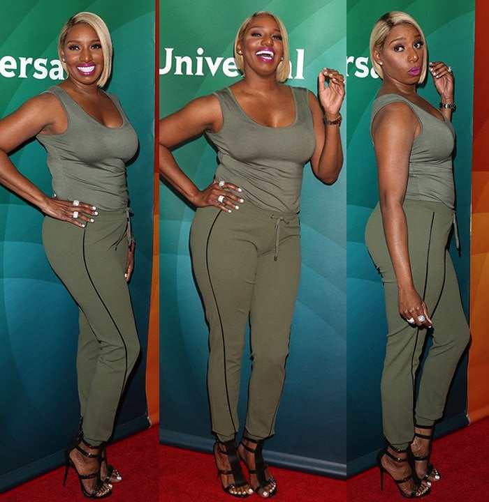 Nene Leakes in army green tank top and matching drawstring pants from her collection