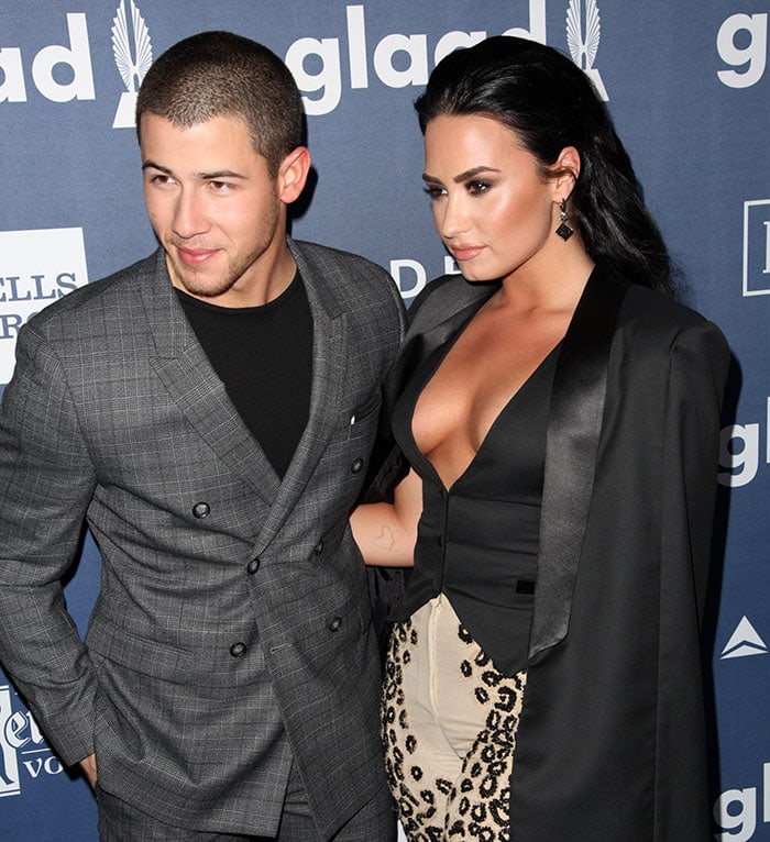 Nick Jonas and Demi Lovato pose for photos together at the GLAAD Awards