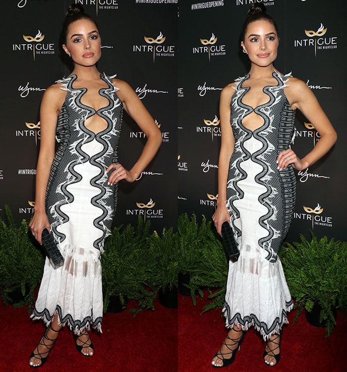 Olivia Culpo wears an interesting Jonathan Simkhai dress on the red carpet of the Intrigue Nightclub grand opening