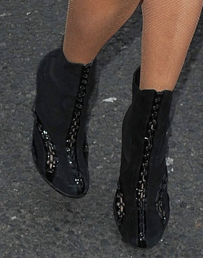 Paris Hilton wears leather-and-suede Alaia boots