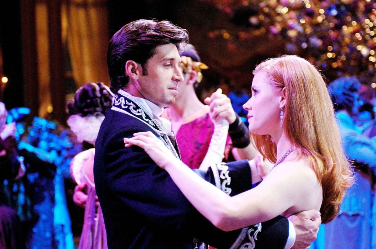 Patrick Dempsey as cynical Manhattan divorce attorney Robert Philip and Amy Adams as singing and dancing princess-to-be Giselle in the 2007 American live-action/animated musical fantasy romantic comedy film Enchanted