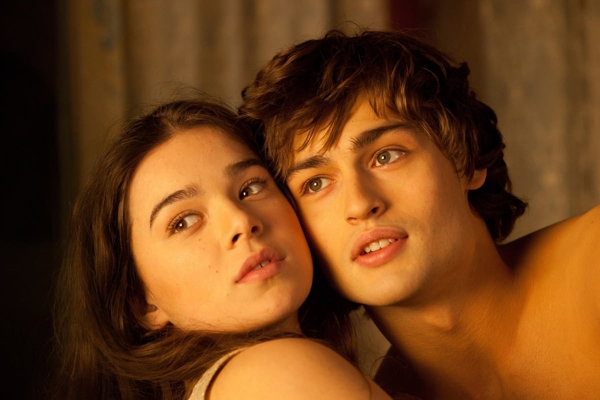 Hailee Steinfeld as Juliet Capulet and Douglas Booth as Romeo Montague in the 2013 romantic drama film adaptation of William Shakespeare's romantic tragedy Romeo & Juliet