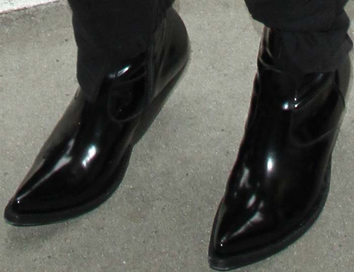 Selena Gomez wears a pair of black Vetements boots