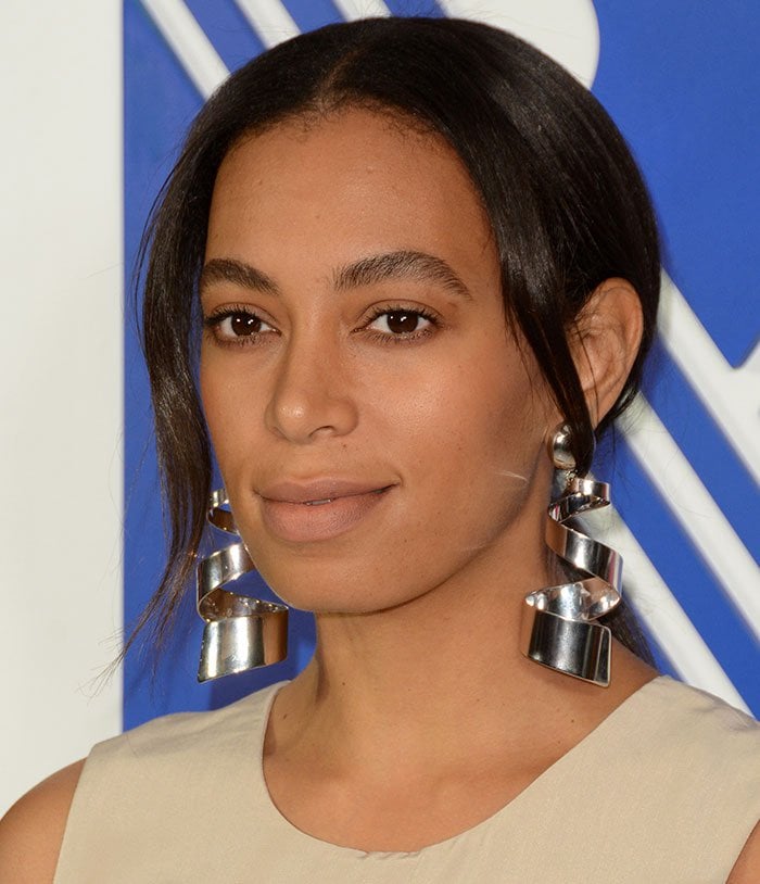 Solange Knowles clips her hair back to show off her earrings at the REED x Kohl's Collection Launch dinner