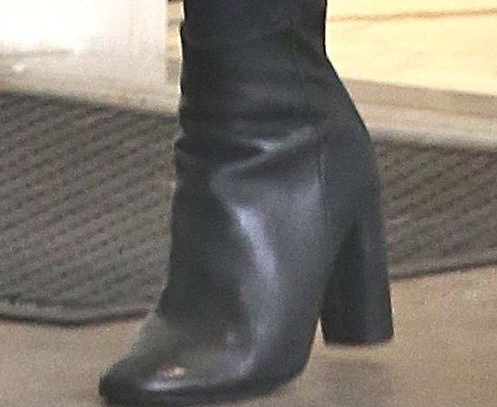 Taylor Swift wears her favorite pair of Topshop booties out shopping