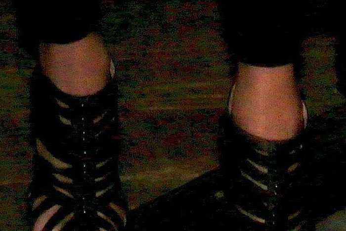 Taylor Swift's feet in Christian Louboutin cage booties